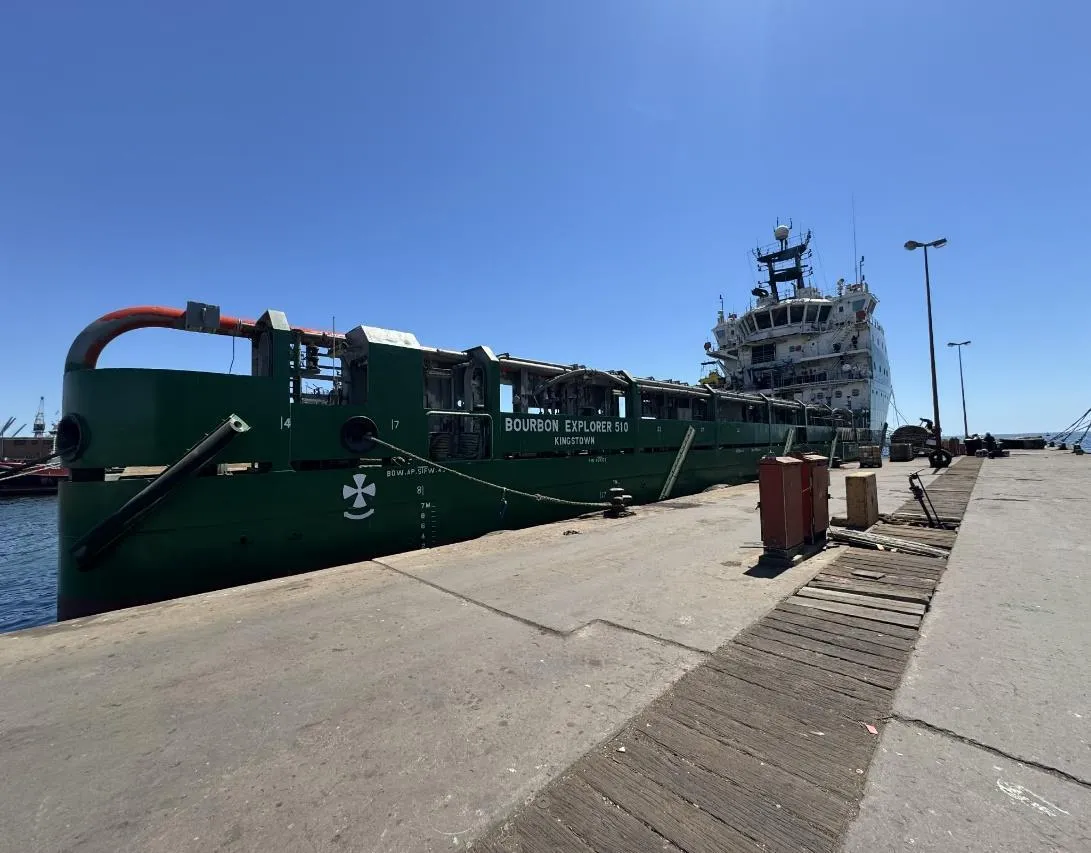 Green-hulled Bourbon Explorer 510 moored alongside a quay in Walvis Bay, Namibia.