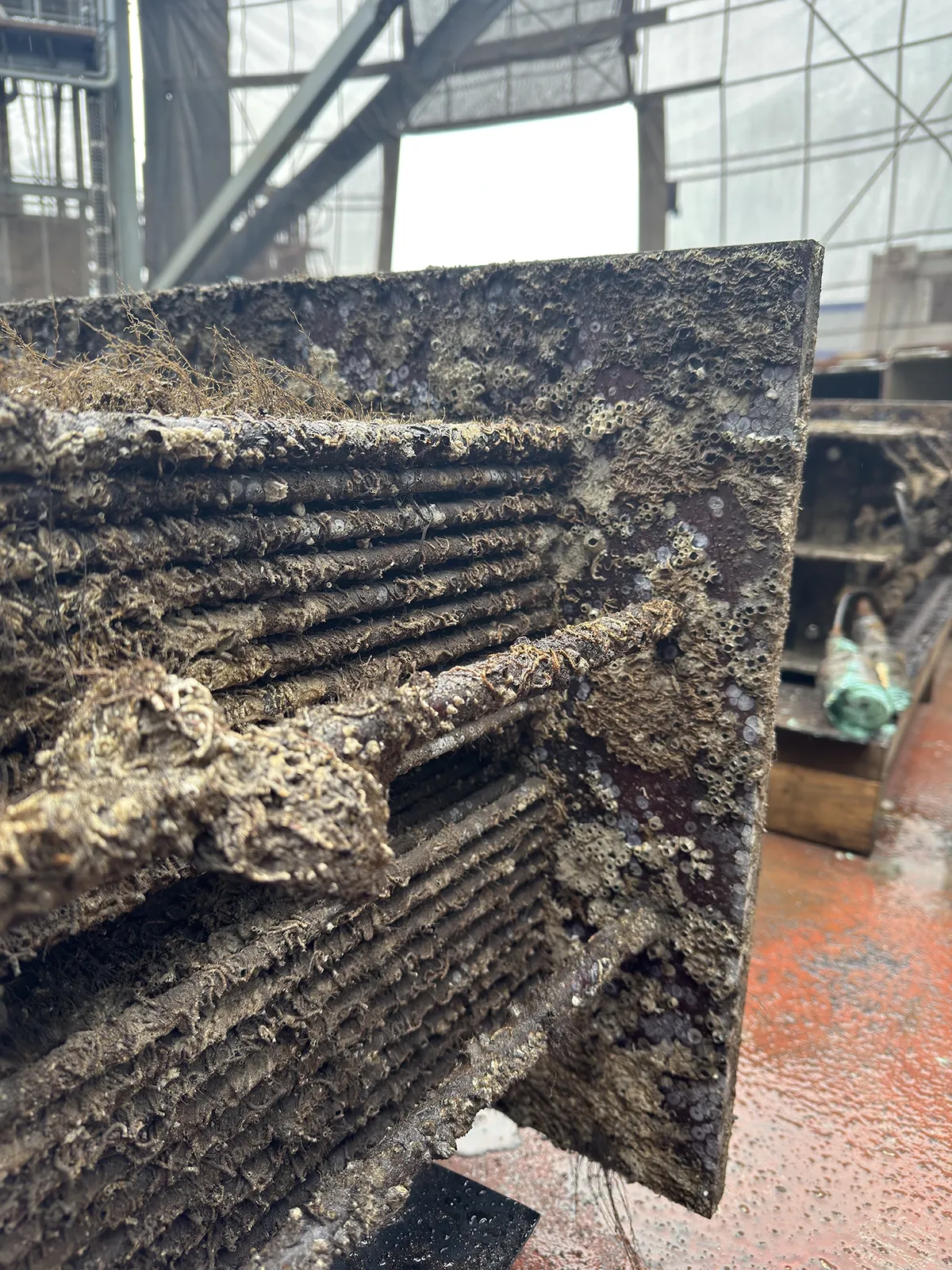 Close up of box cooler on MV Connector before cleaning