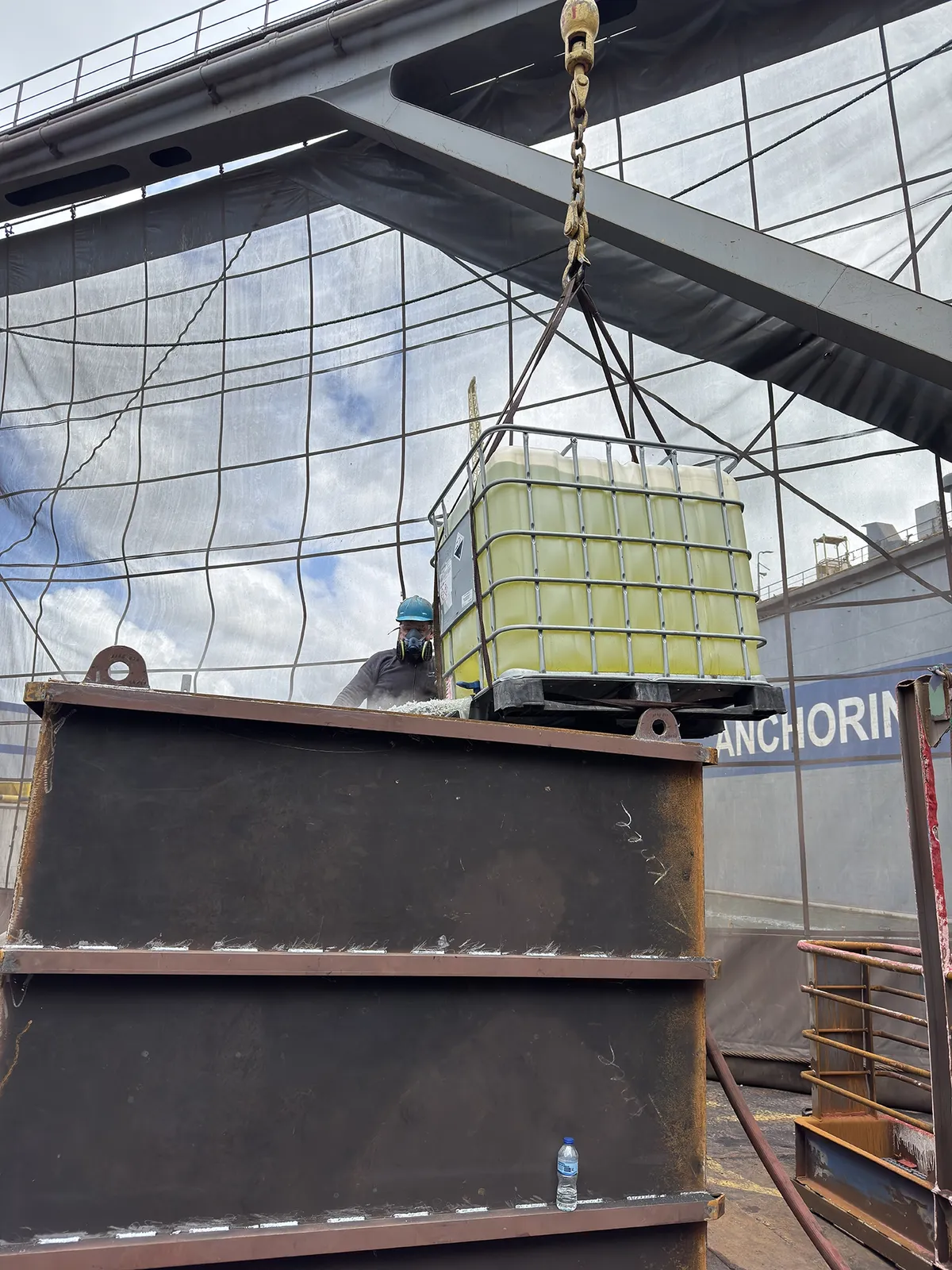 MV Connector - Vegar preparing chemical bath for box coolers